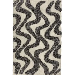 Rechthoekig katoenen tapijt met beige en zwarte motieven 60 x 90 cm