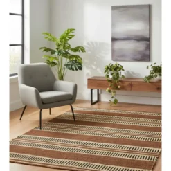 Rechthoekig katoenen tapijt met bruine en ecru motieven 120 x 180 cm
