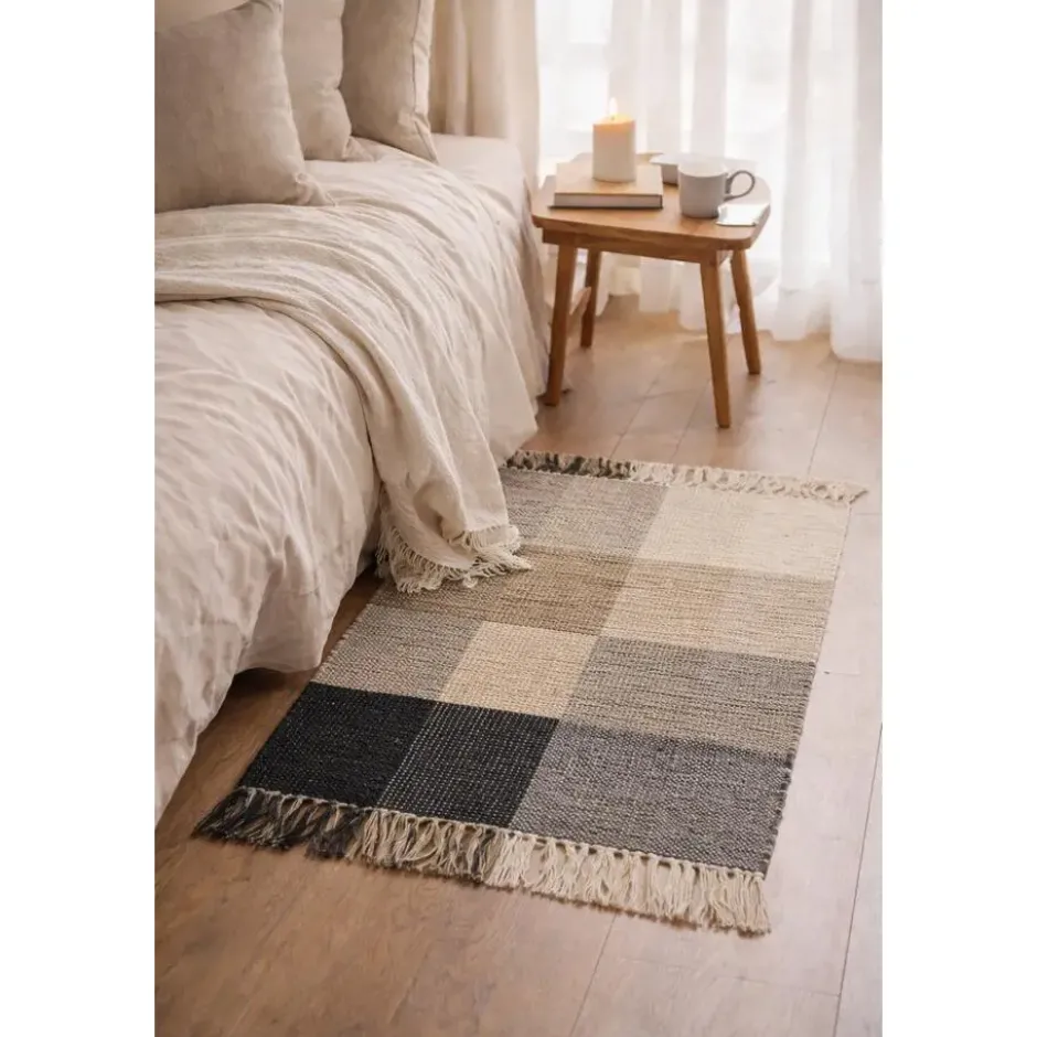 Rechthoekig katoenen tapijt met beige en zwarte motieven 90 x 60 cm