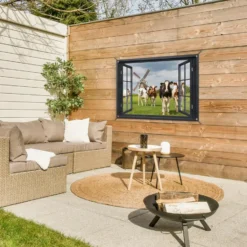 Tuinposter 90x60 cm Doorkijk - Koe - Molen - Koeien - Weiland - Gras - Groen