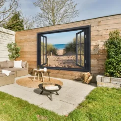 Tuinposter 180x120 cm Doorkijk - Strand - Zee - Zand - Water - Helmgras - Duinen